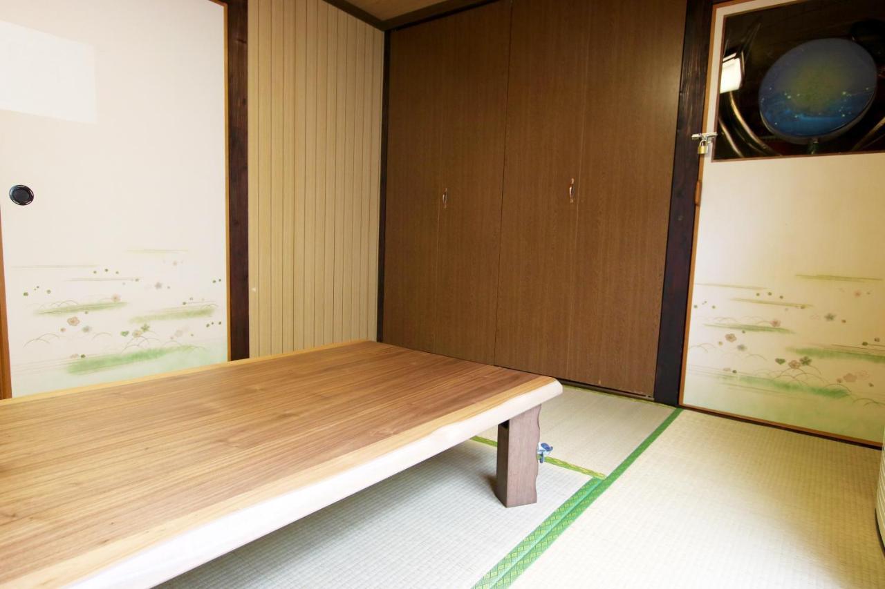 Okinawa Naha Jinjin -沖縄伝統体験型宿じんじん- Екстер'єр фото